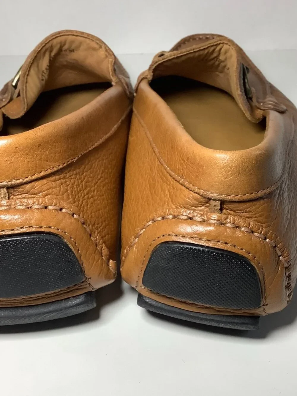 Authentic Donald Pliner genuine leather loafers in a beautiful cognac brown